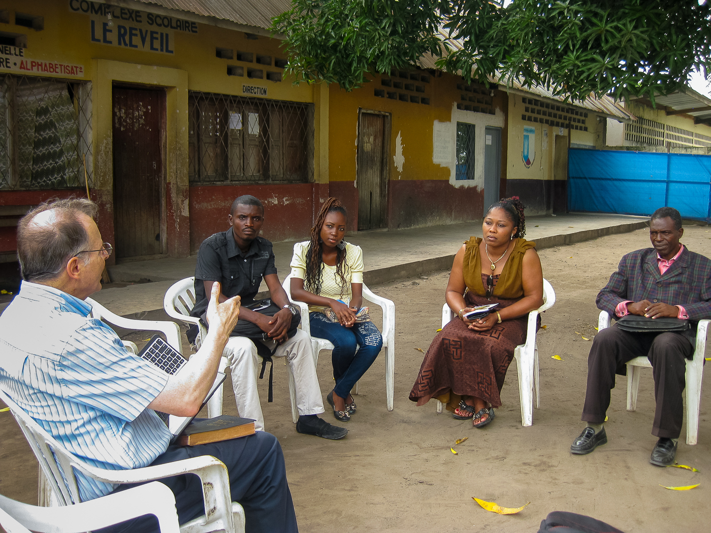 Discussion with a group of checkers.