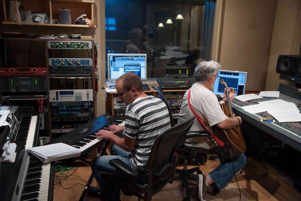 Allan and Roy work to get the guitar track recorded.