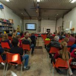 The GS staff, friends and supporters enjoy Allan's music.