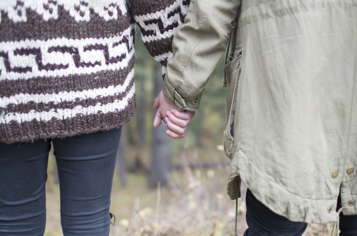 Couple holding hands